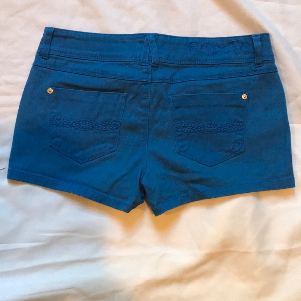 Indigo Rein, blue shorts - Picture 2 of 4